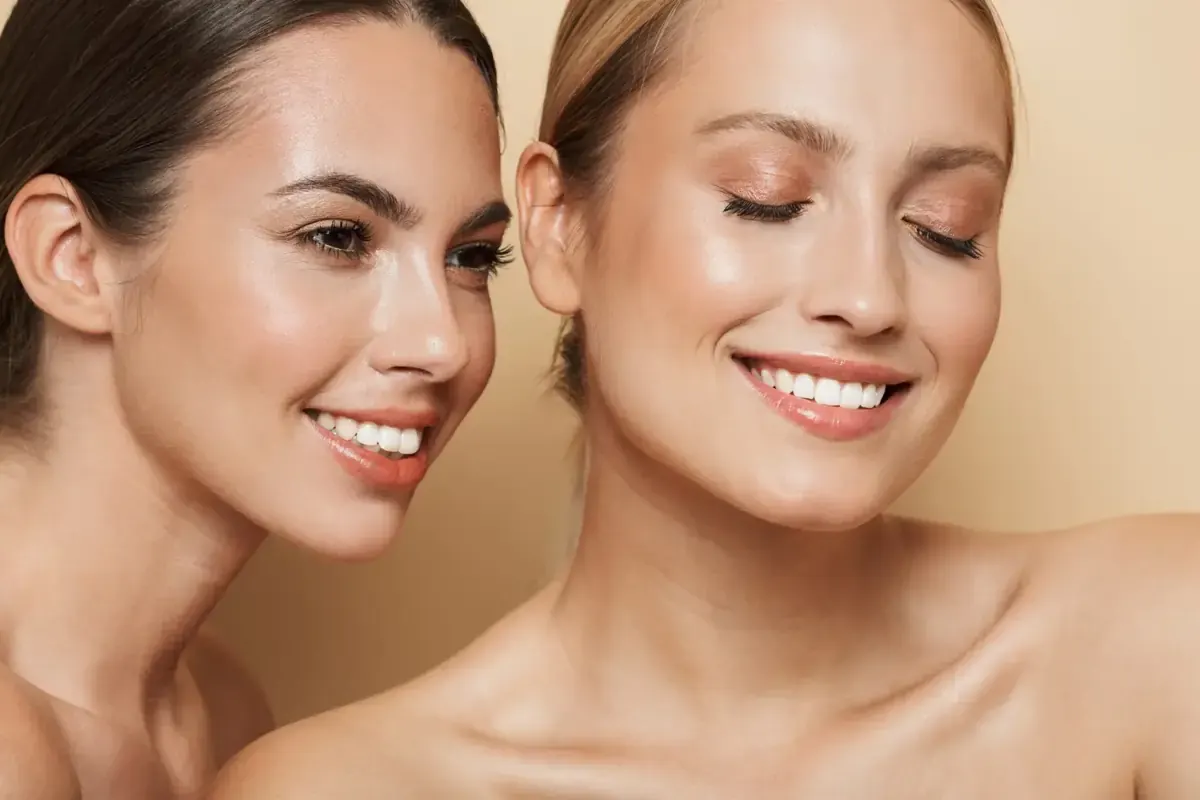Cheery beautiful blonde and brunette women